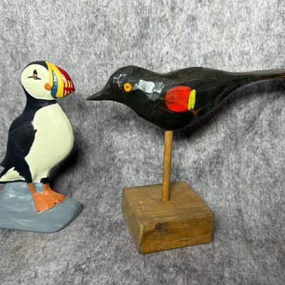 Two Bird Figures Including a Heritage Metalcraft Cast Iron Puffin and a Carved Wood Red-Winged Blackbird