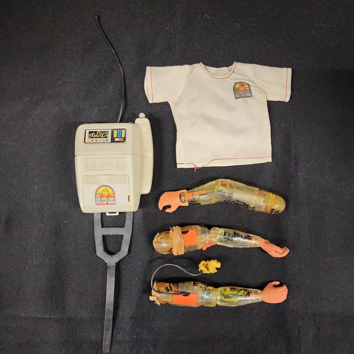 Vtg Six Million Dollar Man - Back Pack Radio, Figure Shirt, 3 Action Figure Replacement Arms