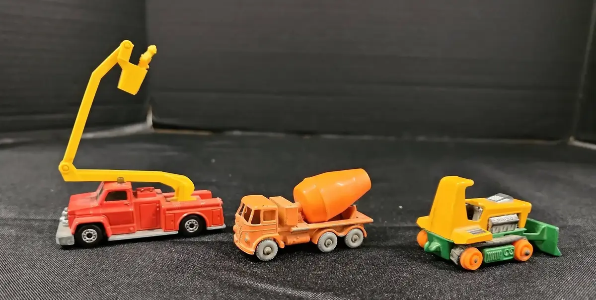 3 Diecast Construction Vehicles - Matchbox Snorkel Fire Engine, Cement Mixer, Big Bull Dozer