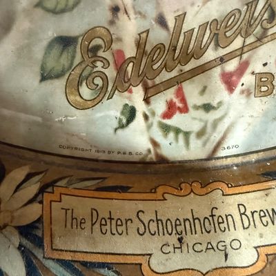 Vintage Edelweiss Beer advertising tray detail, showing a 1913 copyright by P. Schoenhofen Brewing Company of Chicago.