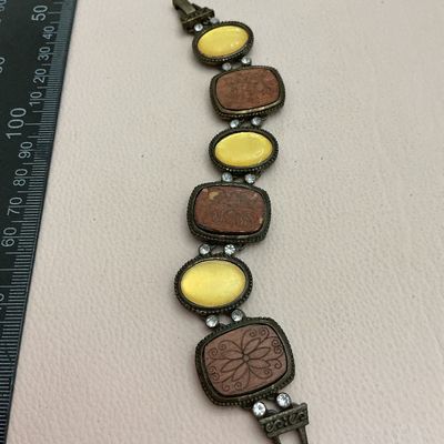 Vintage Brass Link Bracelet with Carved Floral Panels and Yellow Cabochons