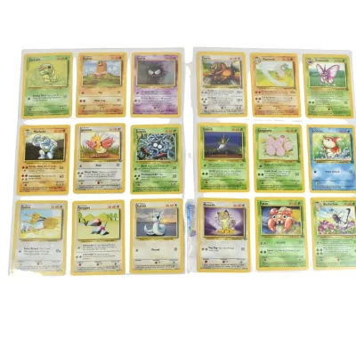 Collection of vintage Pokémon trading cards from the late 1990s, including Caterpie, Diglett, Gastly, and others, displayed in plastic...