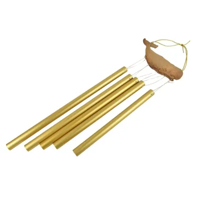 Vintage wind chime featuring five gold-tone aluminum tubes suspended from a ceramic whale-shaped top hanger.