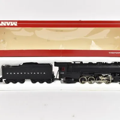 Mantua HO scale Pennsylvania 1130 steam locomotive and tender, housed in its original styrofoam packaging and red box.