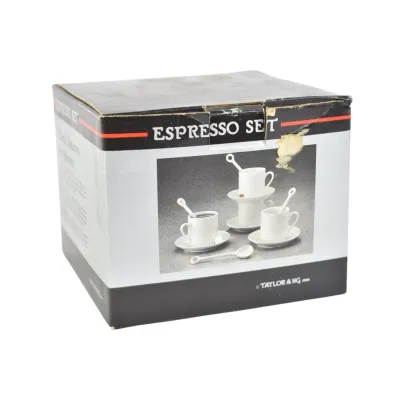Vintage Taylor & Ng espresso set in its original box, dated 1988, featuring white ceramic cups, saucers, and spoons.