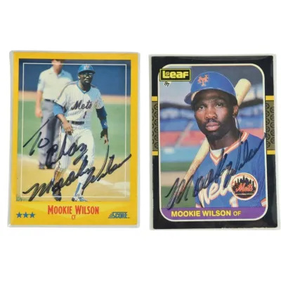 Two autographed Mookie Wilson baseball cards, including a 1988 Score card and a 1987 Leaf card, both featuring the New York Mets...