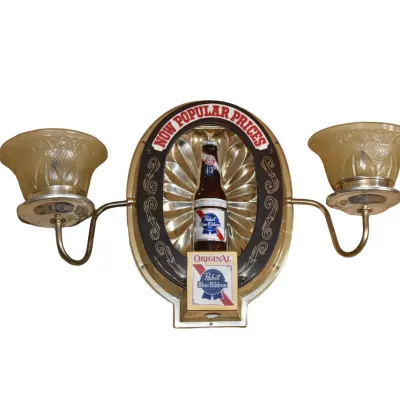 Vintage Pabst Blue Ribbon beer advertising wall sconce light fixture, featuring a central bottle graphic flanked by two amber glass...