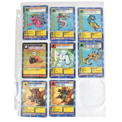 Collection of vintage 1999 Bandai Digimon trading cards, including Shellmon, Megaseadramon, and Seadramon, housed in a plastic binder...