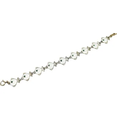 Vintage sterling silver and white guilloche enamel fish link bracelet, featuring green enamel eyes and a spring ring clasp.
