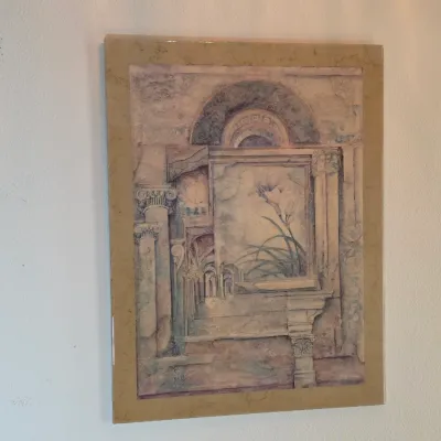Framed art print featuring classical architectural elements and a floral motif in muted pastel tones, circa late 20th century.