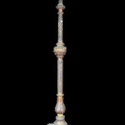 Ornate carved wood floor candlestick or pedestal stand with a distressed gold gilt finish, featuring a spiral-turned column and a tripod...