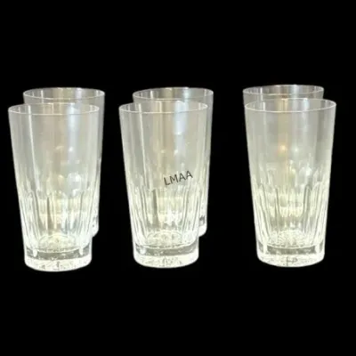 Set of eleven vintage crystal highball glasses featuring a classic thumbprint and vertical cut pattern.