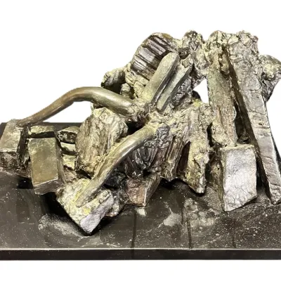 Abstract brutalist bronze sculpture featuring jagged, geometric forms and curved elements, mounted on a dark rectangular base.