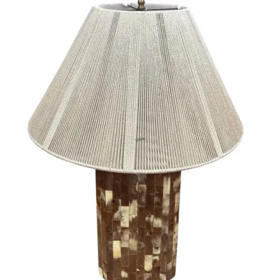Maitland-Smith style tessellated horn and bone table lamp, featuring a hexagonal column base and a pleated fabric shade.