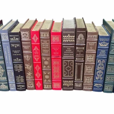 Collection of thirteen Franklin Library leather-bound classic books, featuring gilt-decorated spines and page edges.