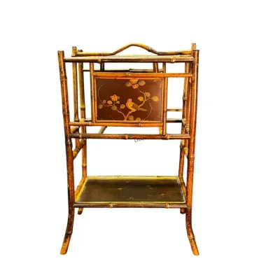 Antique Victorian faux bamboo magazine rack and stand, featuring a hand-painted lacquer panel with a bird and floral motif.