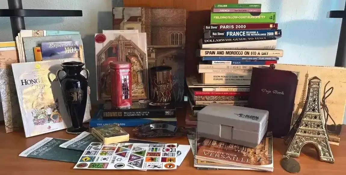 All About Traveling With Maps, Decor, Books, Voltage Converters, And More
