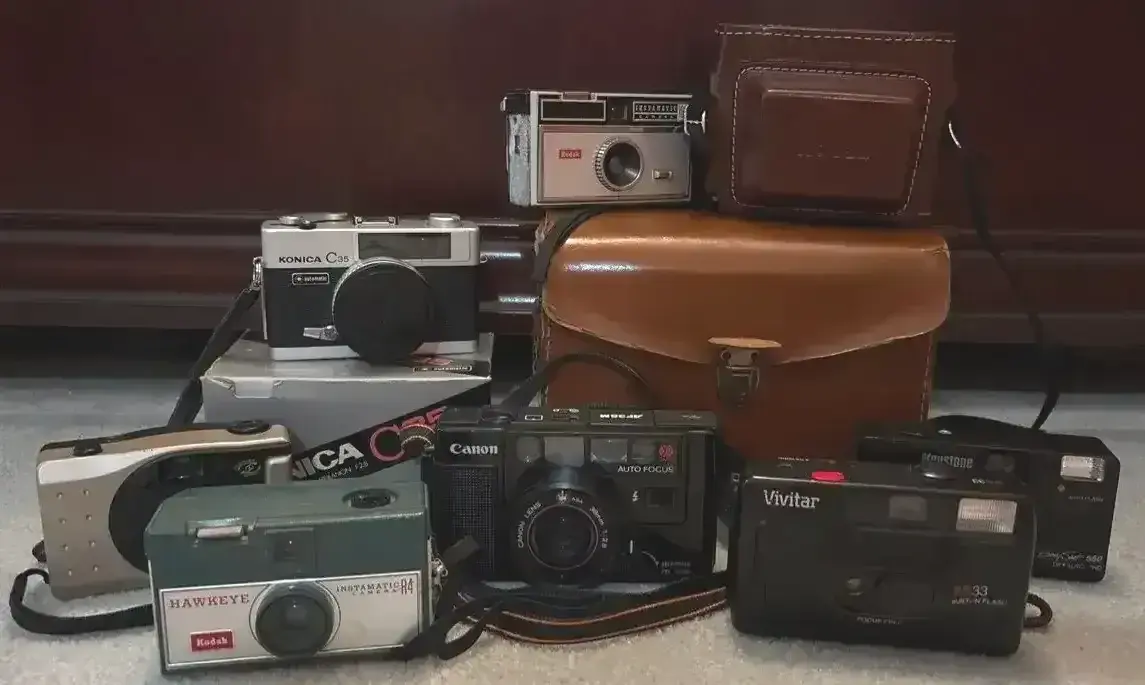 Camera Assortment Of Kodak Canon Konica Hawkeye Vivitar And Keystone 