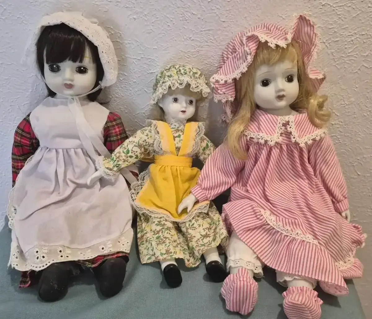 Set Of 3 Porcelain  Dolls Dressed In Vintage Prairie Outfits & Bonnets 