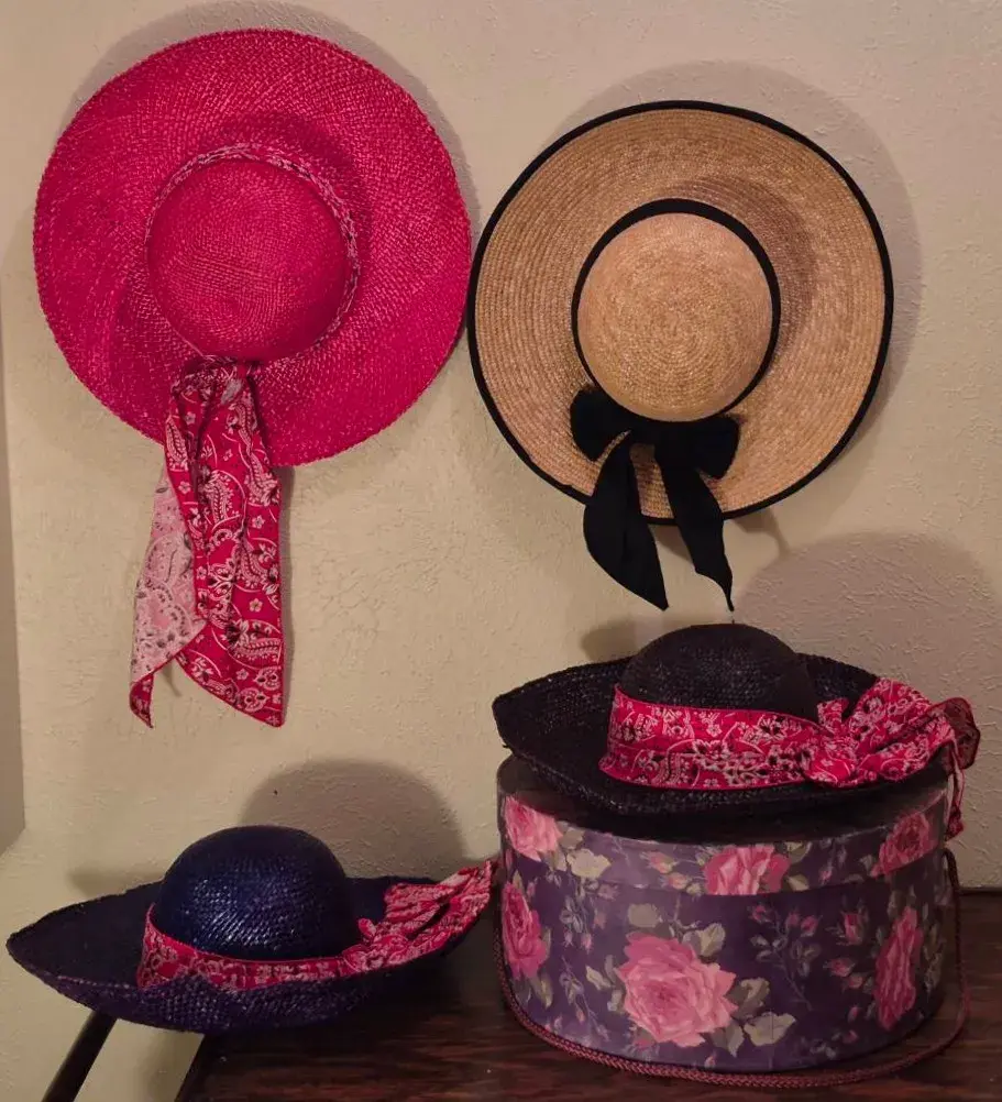 Women's  Color Woven Straw Sun Hat Accented with a Vibrant Red Paisley Bandana-Print Ribbon bow.    
