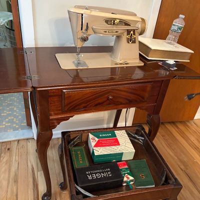 Vintage Walnut sewing machine in Cabinet and stool 