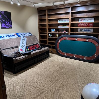 Game room with poker table 