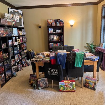 The ultimate game room filled with signed Packer jerseys, game table, game shirts and games!!