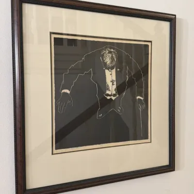 Sale Photo Thumbnail #118: Framed and matted linocut print depicting a conductor bowing, signed and numbered by the artist.