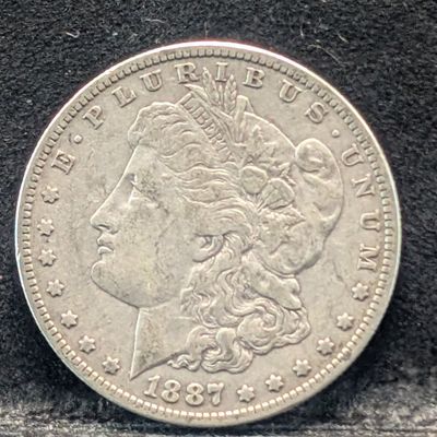 Sale Photo Thumbnail #375: 1887-O Morgan 90% Silver Dollar