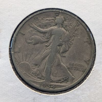Sale Photo Thumbnail #29: 1934 Walking Liberty 90% Silver Half Dollar