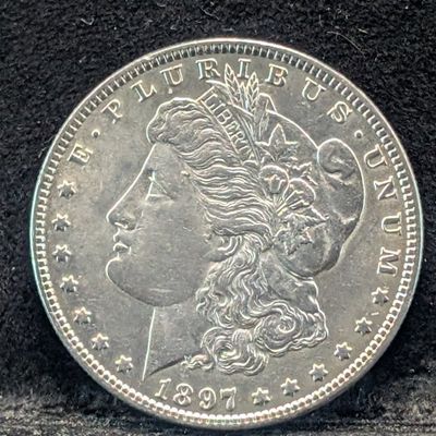Sale Photo Thumbnail #387: 1897 Morgan 90% Silver Dollar