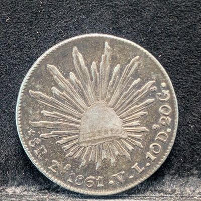 Sale Photo Thumbnail #95: 1861 Mexican 8 Reales, .903 Silver, 27.07g