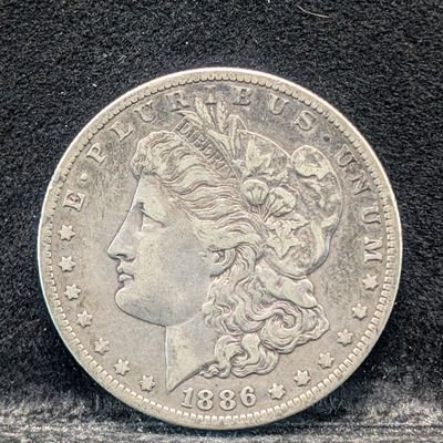 Sale Photo Thumbnail #261: 1886-O Morgan 90% Silver Dollar
