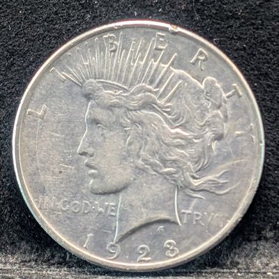 Sale Photo Thumbnail #61: 1923 Peace 90% Silver Dollar