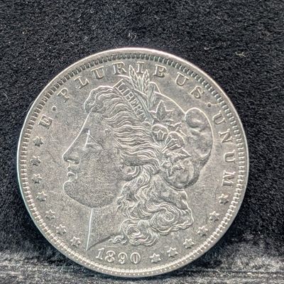 Sale Photo Thumbnail #73: 1890 Morgan 90% Silver Dollar