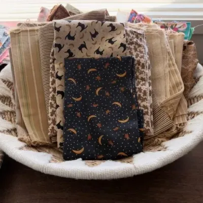 Quilting fabric lot in coiled basket