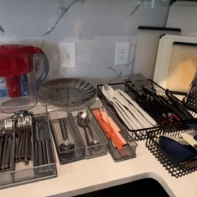 Water filter pitcher, stainless flatware, drawer organizers