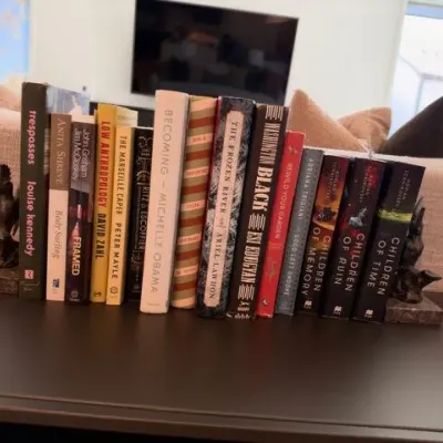 Pair of bird bookends with hardcover books