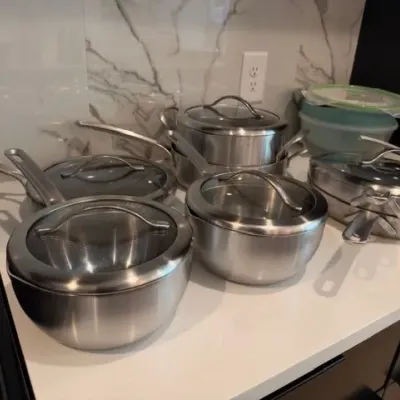 Stainless steel cookware set with glass lids