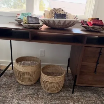 Mercana Glenn wood desk with drawers, woven baskets, bowls