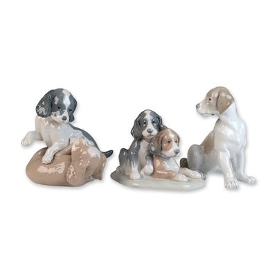 Sale Photo Thumbnail #203: Three Lladro and Nao by Lladro Porcelain Puppy Figurines