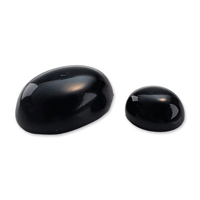 Sale Photo Thumbnail #335: Two Loose Black Onyx Type Cabochons