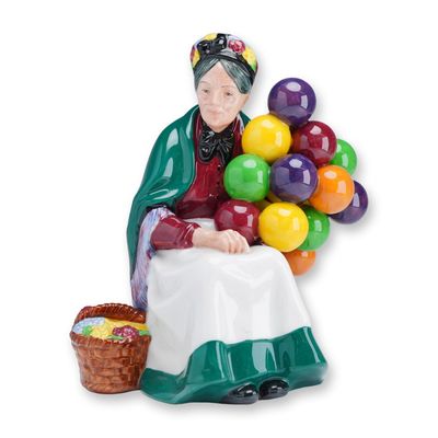 Sale Photo Thumbnail #93: Royal Doulton Porcelain Figurine, The Old Balloon Seller HN 1315