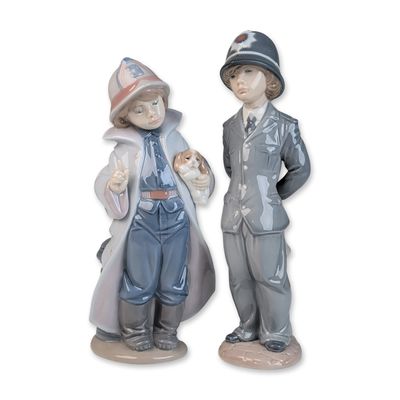 Sale Photo Thumbnail #372: Two Lladro Porcelain Little Professional Figurines, Fireman 01006334 & Policeman 01006367