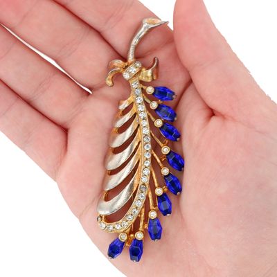 Sale Photo Thumbnail #83: Gold Tone Blue Rhinestone Studded Feather Brooch
