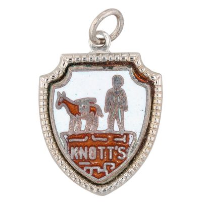 Sale Photo Thumbnail #177: Signed Sterling Silver Enamel "Knott's" Shield Charm