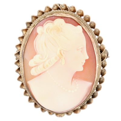 Sale Photo Thumbnail #304: Victorian Gold Filled Carved Shell Cameo Ribbon Framed Brooch Pendant