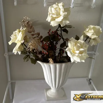 White Metal Shelf with Floral Arrangement