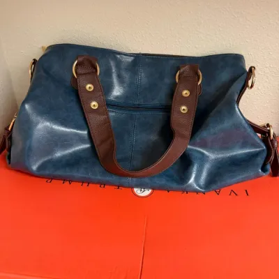 Blue Handbag with Brown Handles