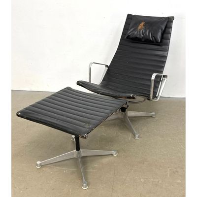 Vintage Herman Miller Eames Aluminum Group Lounge Chair and Ottoman with 4 Star Swivel Base and Ribb
